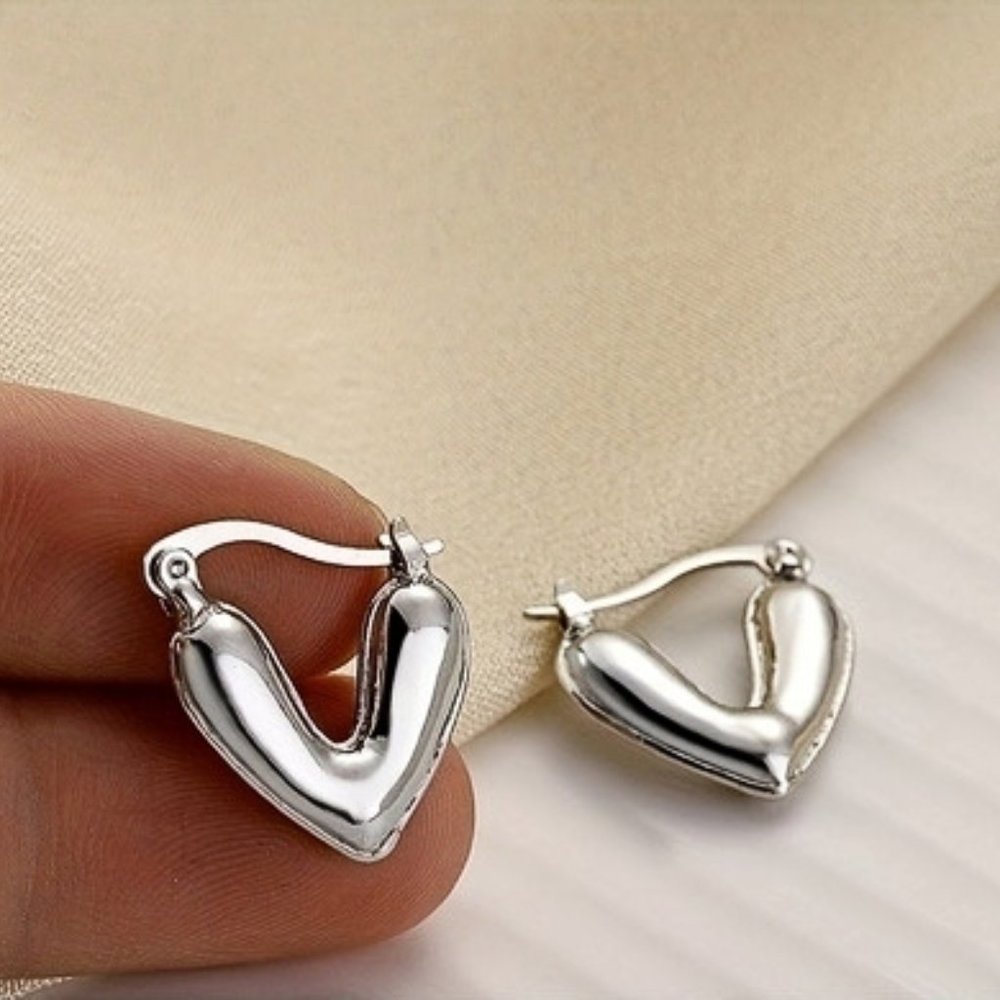Minimalist Hoop Earrings with a heart-hollowed design